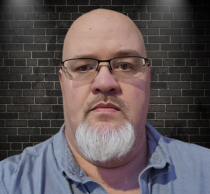 headshot pic of John Simpson